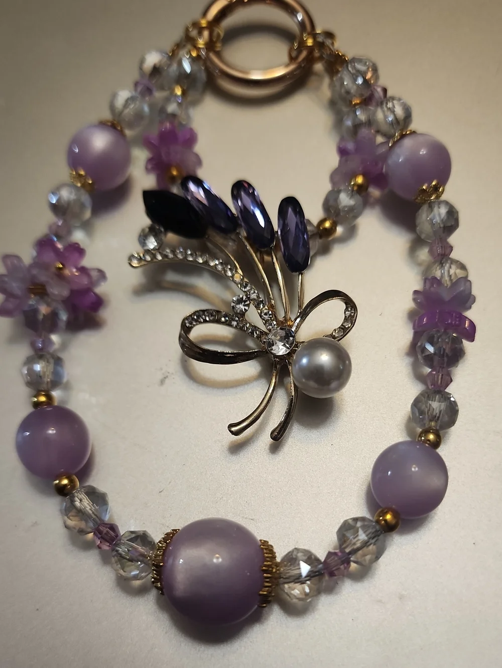 Purple Beaded Phone Charm with Crystal Flower Brooch